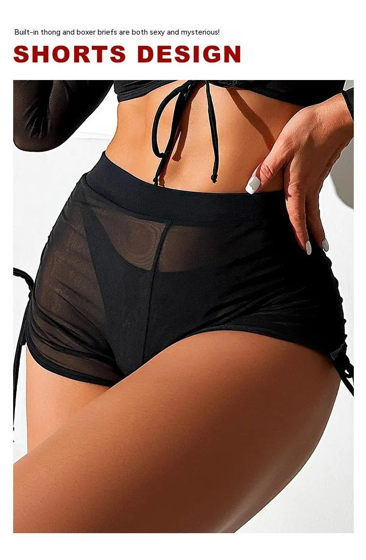 Women's black mesh four-piece bikini set with long sleeves and briefs bottom