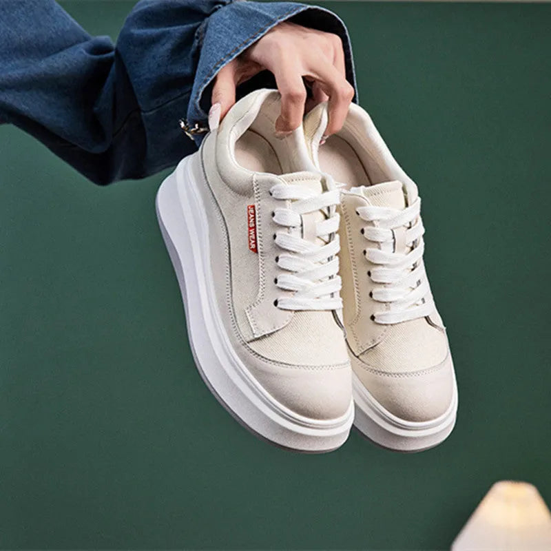 Women's beige and pink thick-soled leather board shoes on a white background.