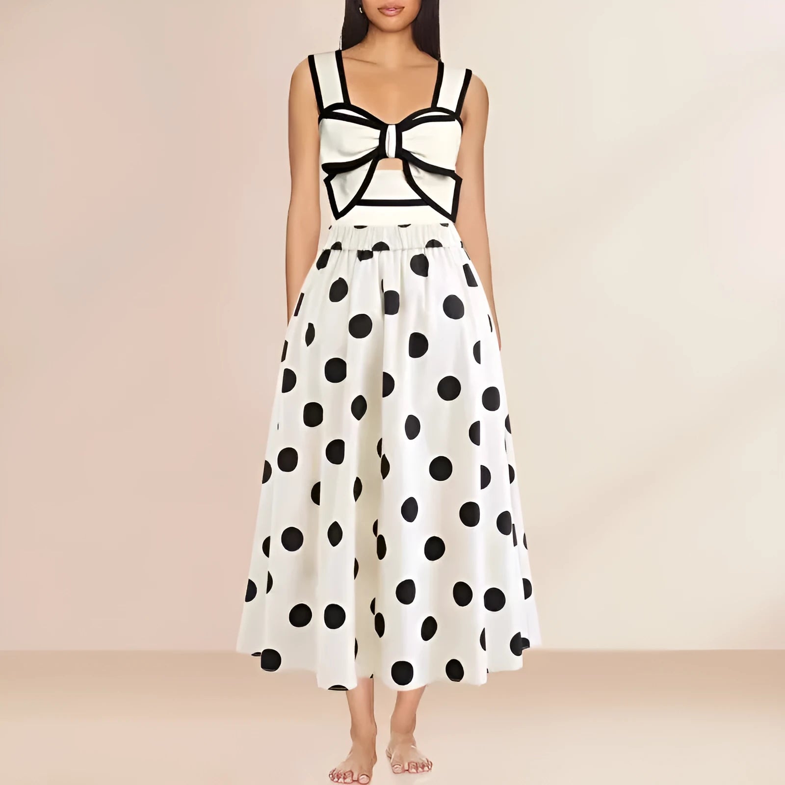 Female one-piece swim dress with round skirt and bow detail in polyester fabric