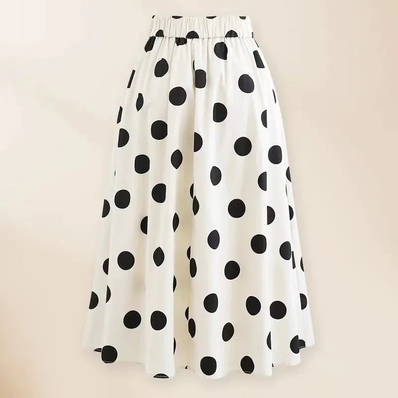 Female one-piece swim dress with round skirt and bow detail in polyester fabric