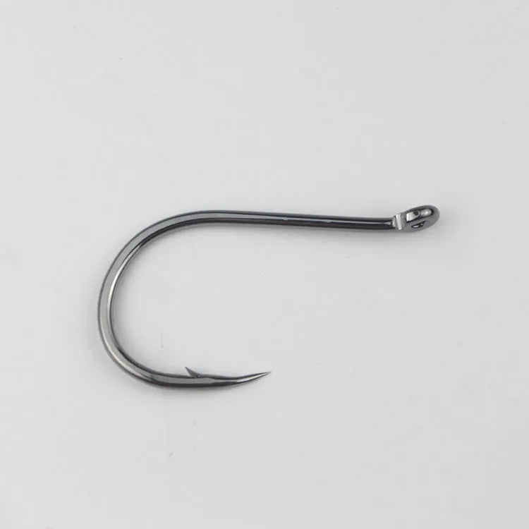 Bulk pack of barbed fishing hooks with crooked mouth and hole ring in alloy carbon steel.
