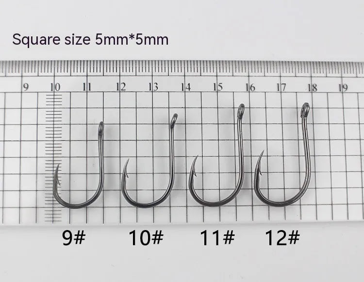 Bulk pack of barbed fishing hooks with crooked mouth and hole ring in alloy carbon steel.