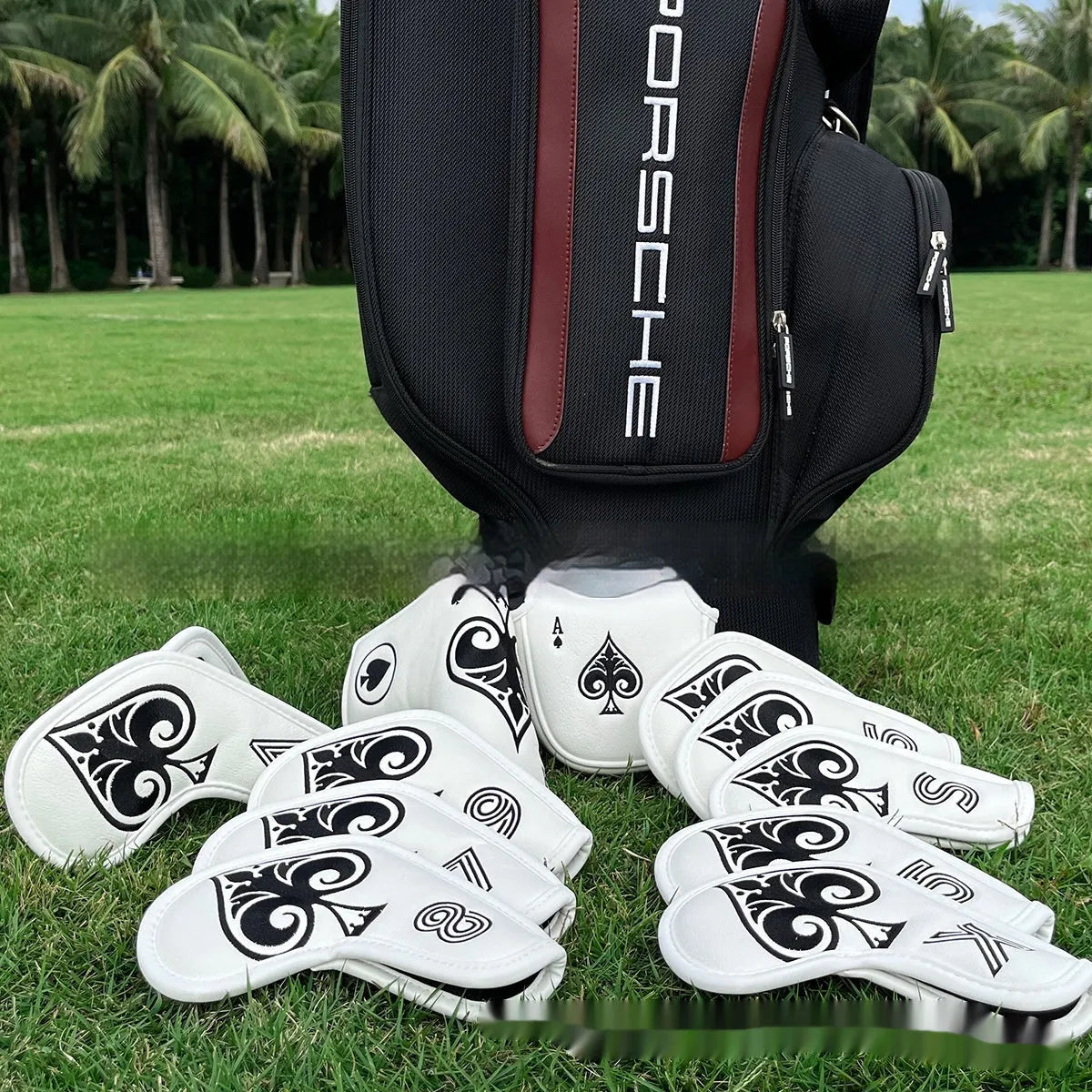 A black PU golf putter sleeve cover designed to protect a standard-sized club head.