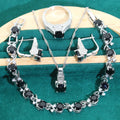 Bridal zircon four-piece jewellery set with necklace, earrings, bracelet, and ring in water wave chain style.