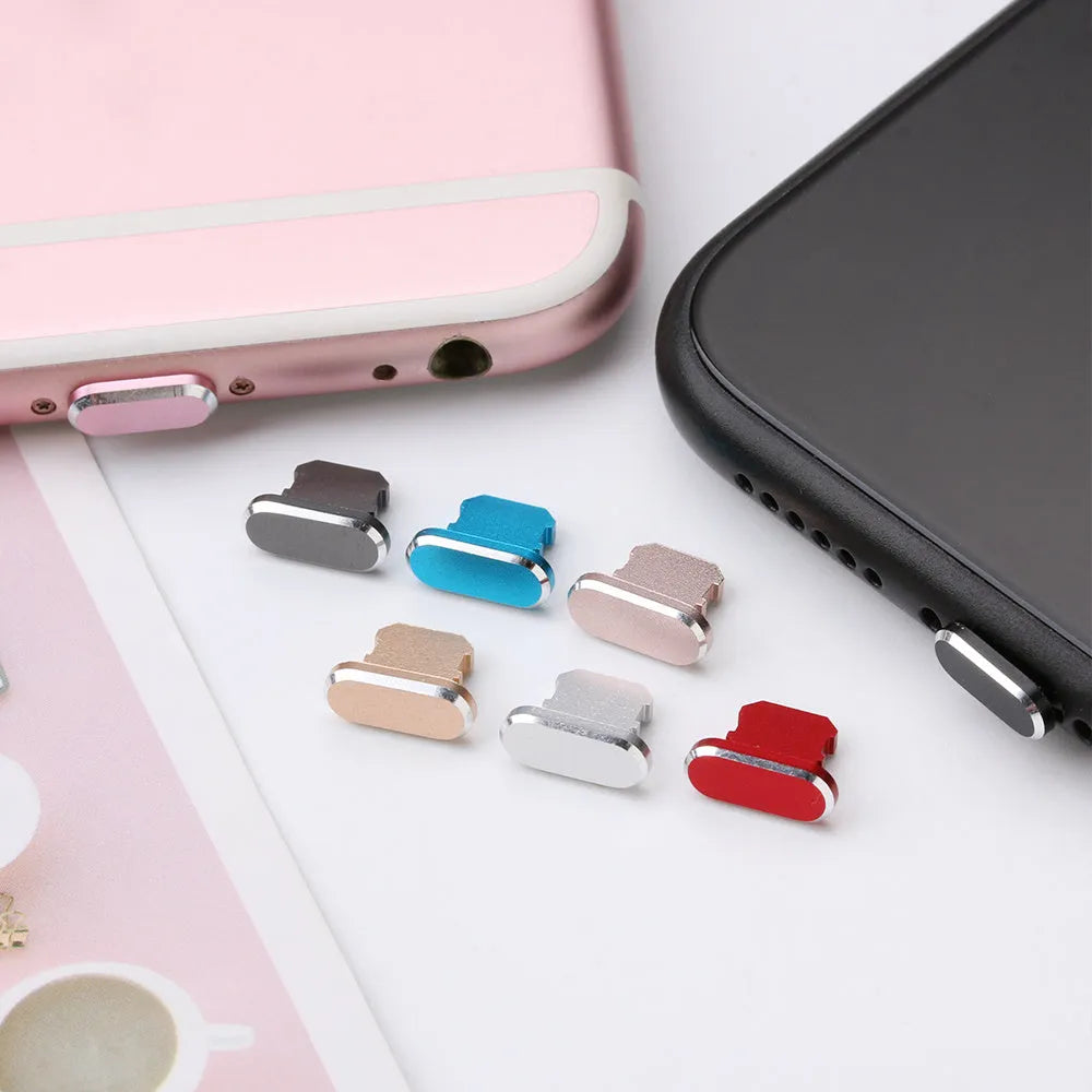 Aluminium alloy charging port dust plug for iPhone in various colours including gold, silver, blue, and rose gold.