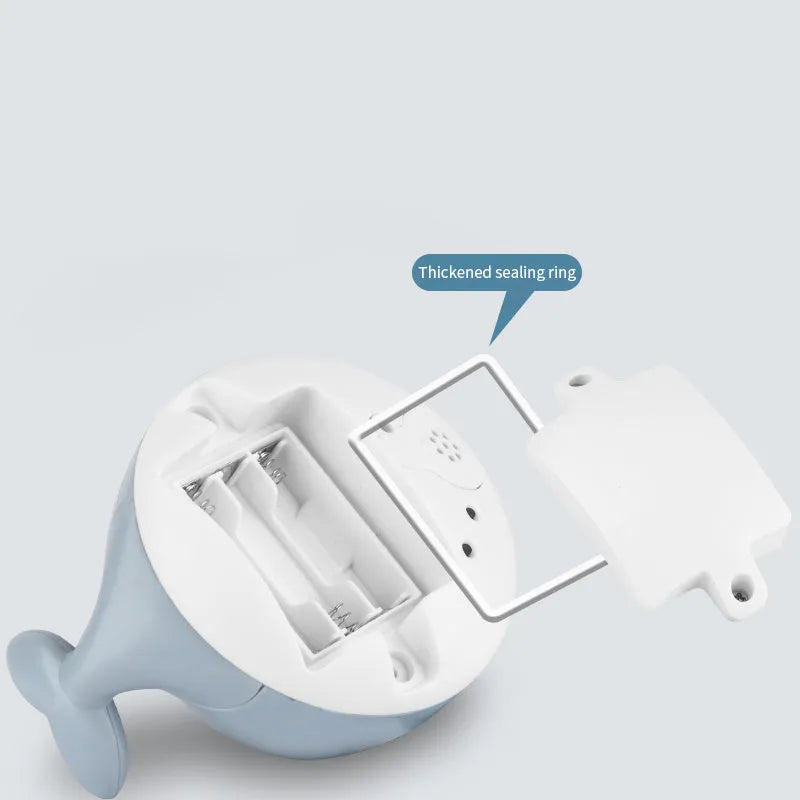 Electric induction whale bath spray toy with automatic water sensor and coloured LED lights floating in water