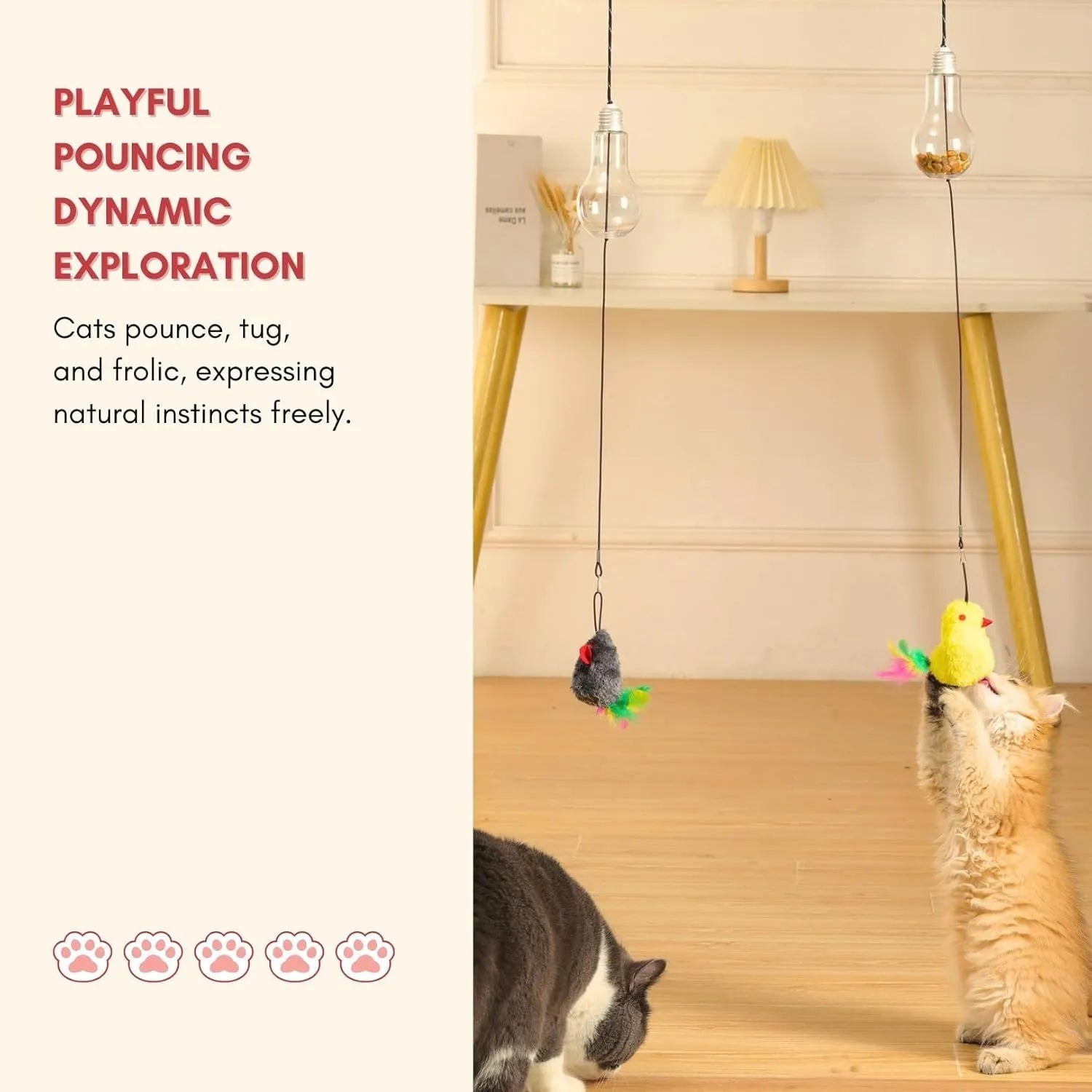 Gray and yellow hanging interactive cat toy with treat dispenser extended on elastic rope