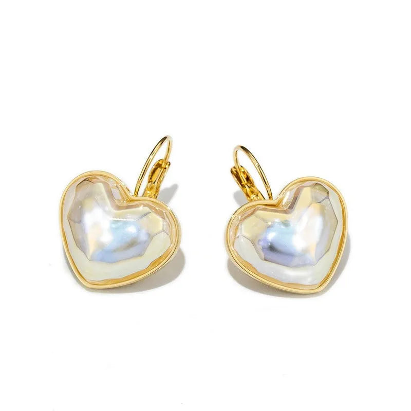 Gold-coloured alloy women's ear clip earrings in a natural style.