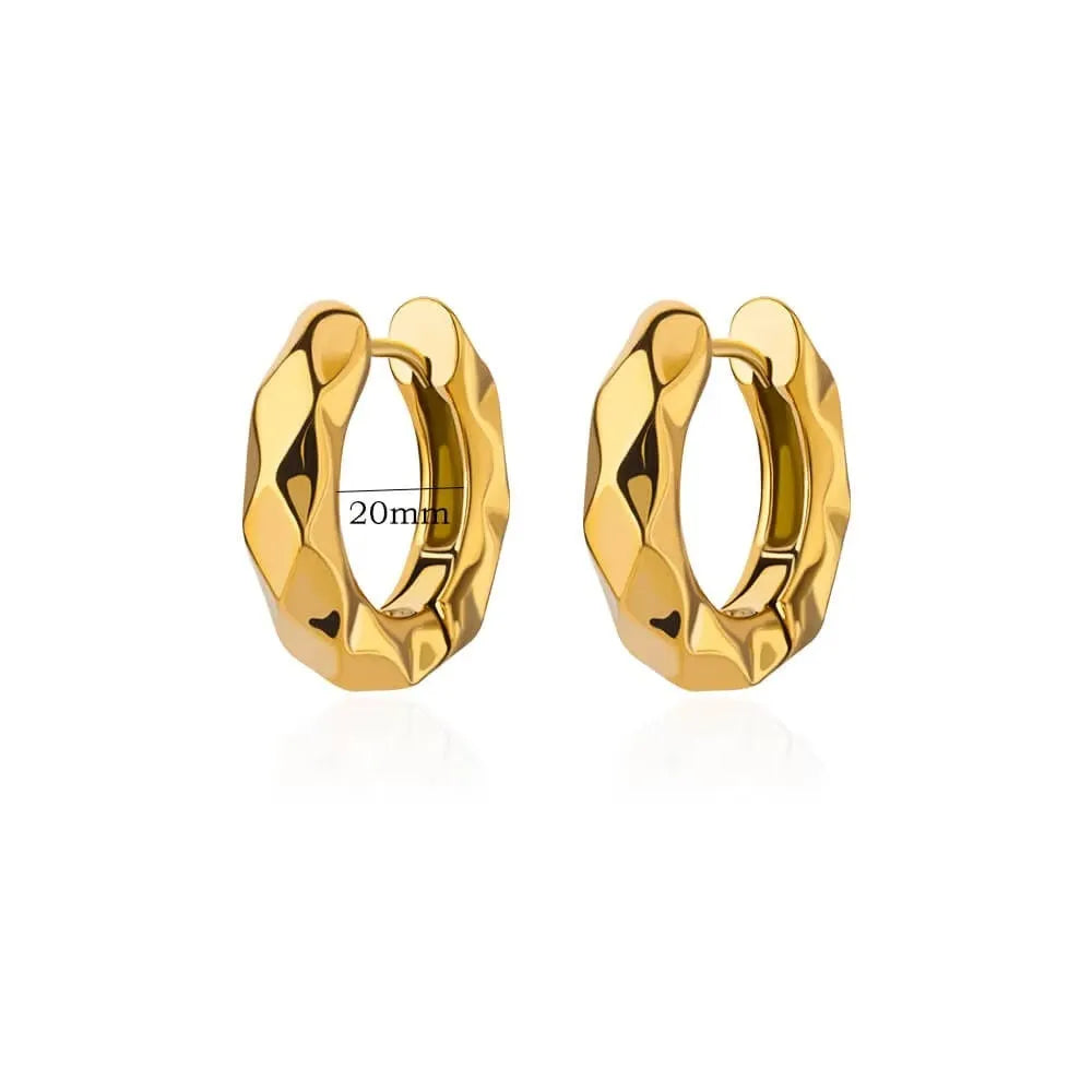 Geometric butterfly earrings for women in copper alloy with heart, bow, and star shapes.