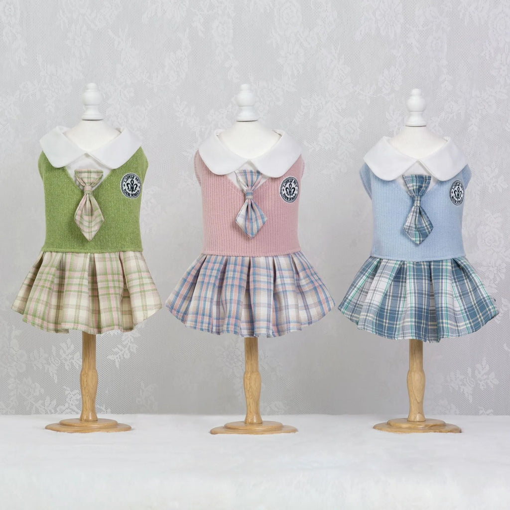 A tartan skirt for small pets in pink, blue, or green, made from polyester fabric.