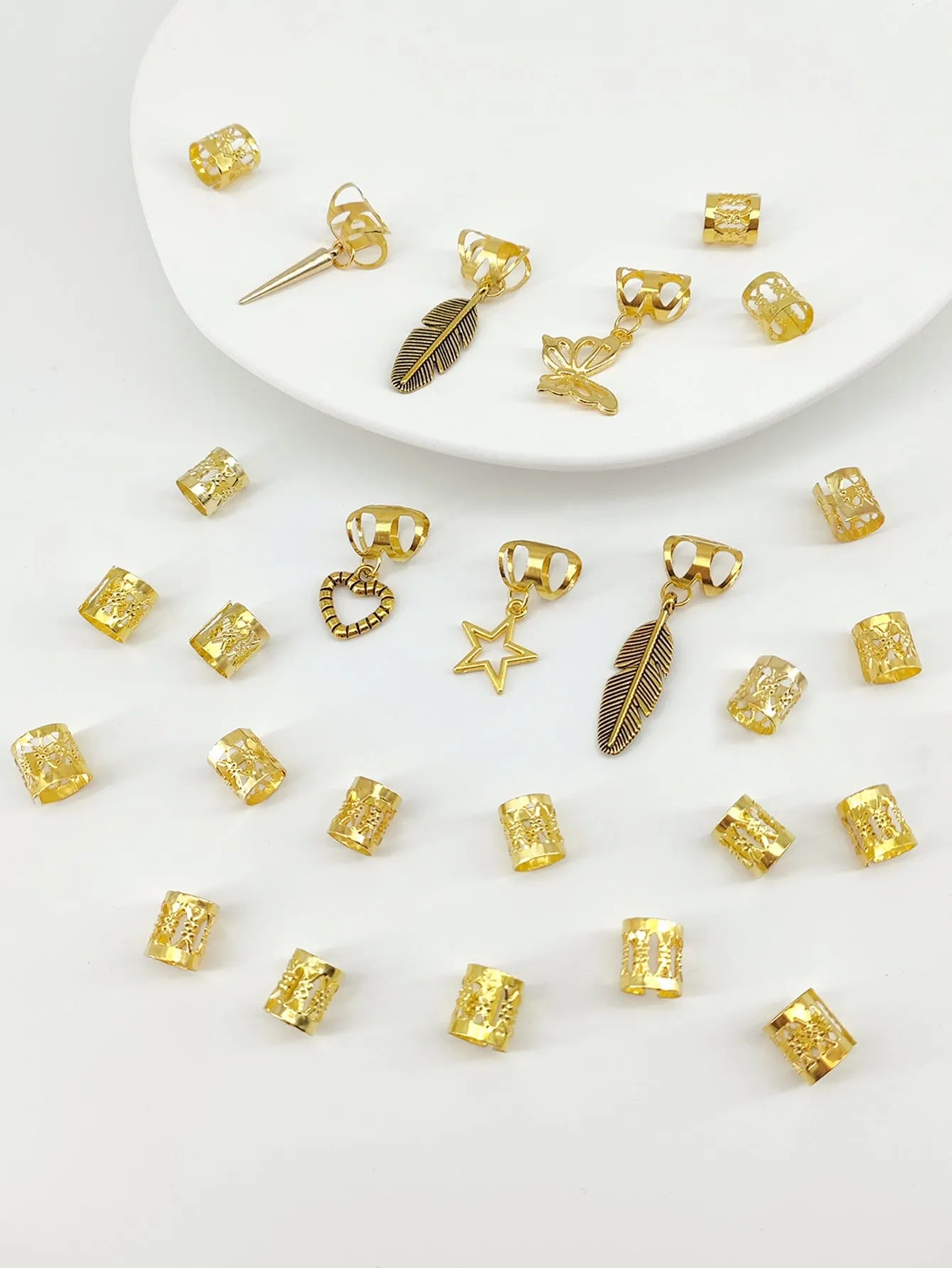 26-piece pack of antique style hair rings with trendy leaves design in gold or silver electroplated alloy