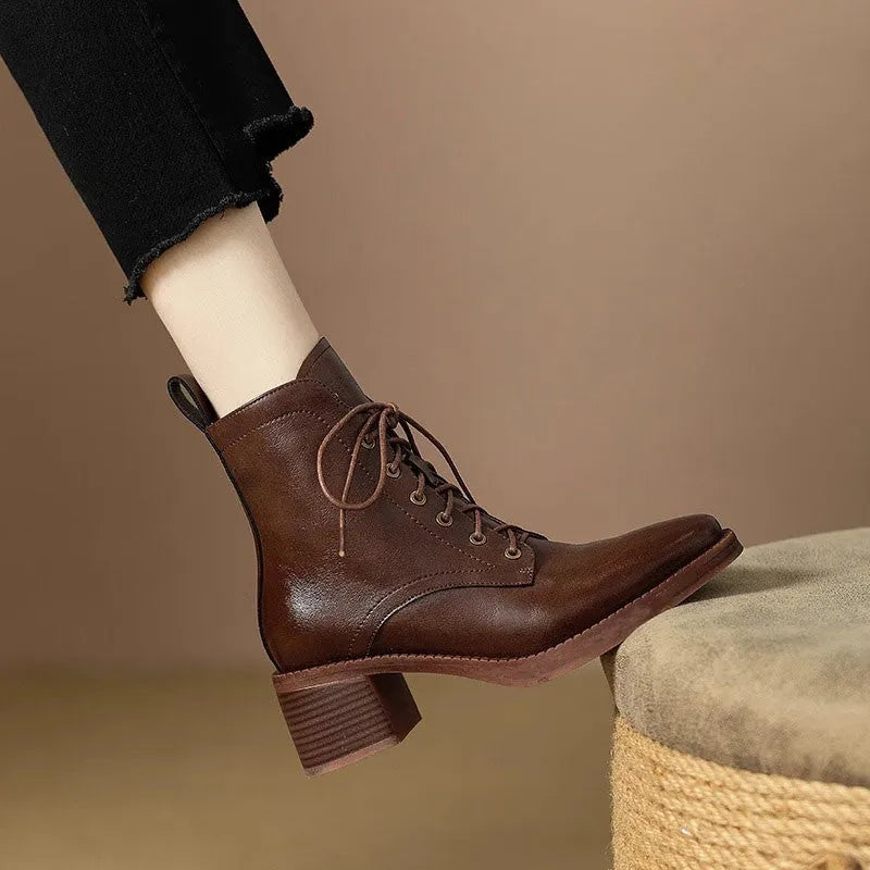 Women's black pointed-toe ankle boots with 5.5cm heel and 13cm shaft