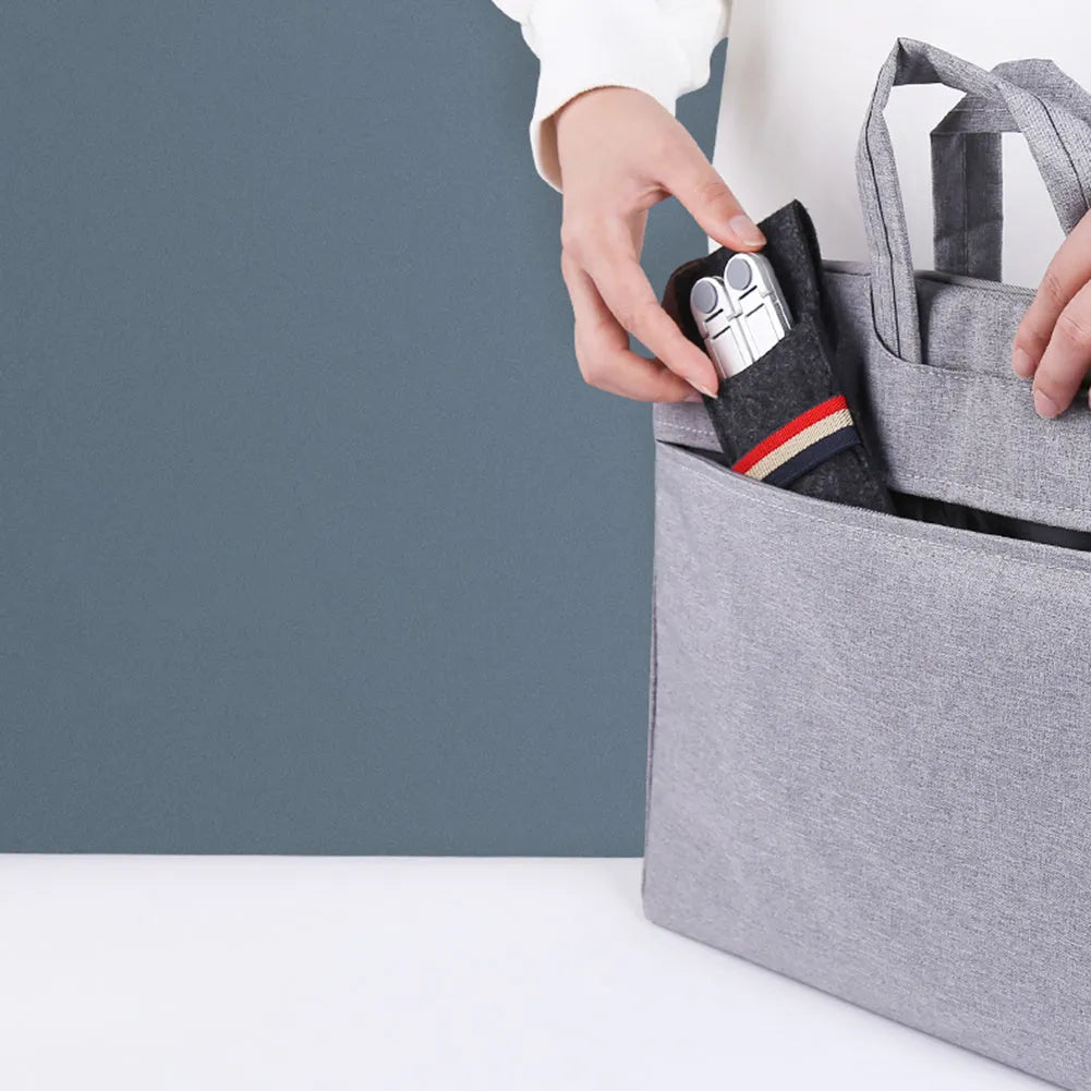 Foldable aluminium laptop stand in silver, shown open in use and closed for storage.