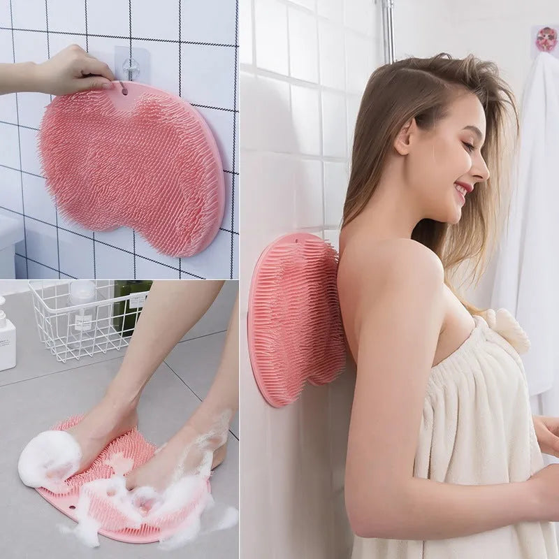 Orange silicone bristle bath brush with suction cups on base, size 23x30cm, for foot and back cleaning.