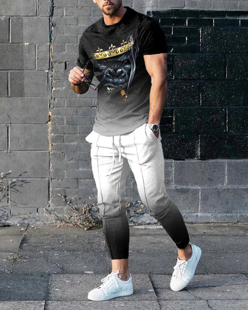 Man wearing a blue short-sleeved round neck pullover and matching trousers from a polyester sportswear set.