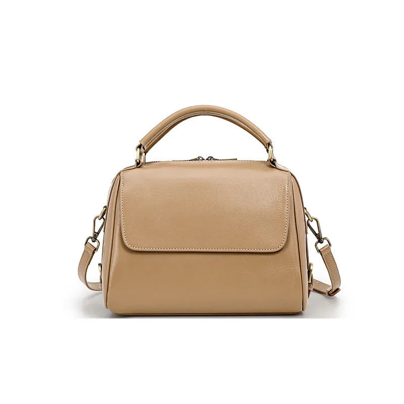 Genuine leather crossbody tote bag in a cross square shape with double straps and internal organiser pockets.