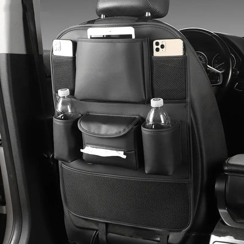 Leather car seat back storage bag in choice of four colours mounted behind vehicle seat