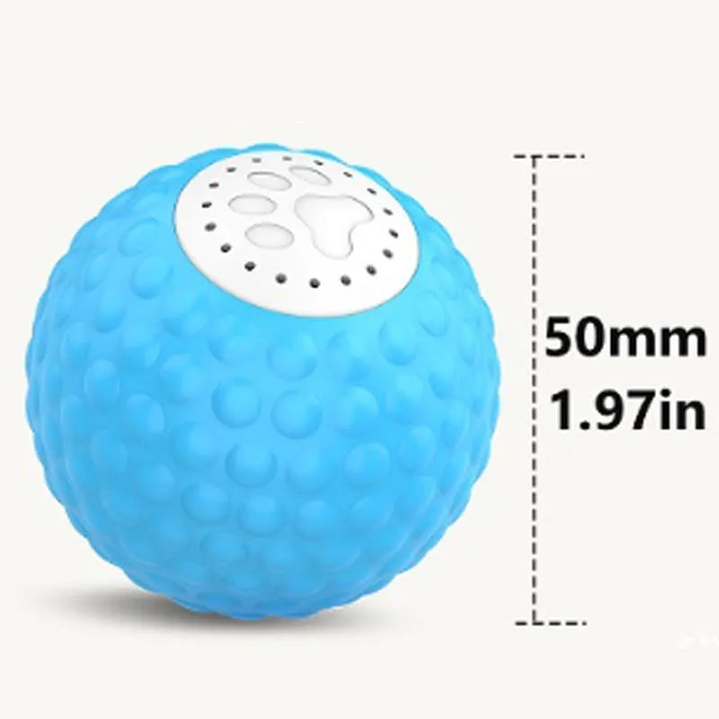 Remote control and a blue interactive cat ball toy on a wooden floor.