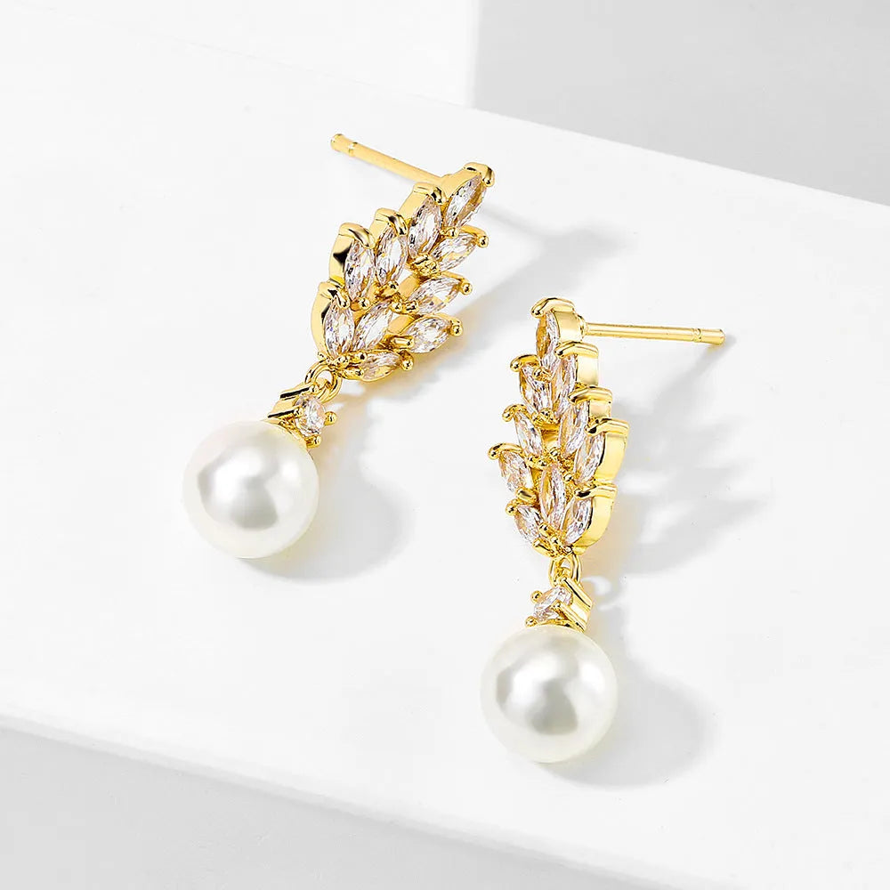 Geometric stud earrings with micro inlaid zircon detailing and floral design in gold, platinum, or rose gold plating
