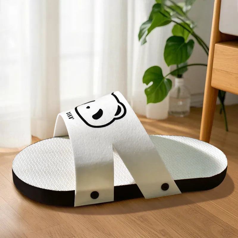 White corrugated paper cat scratch board with slipper-style shape for floor or wall use