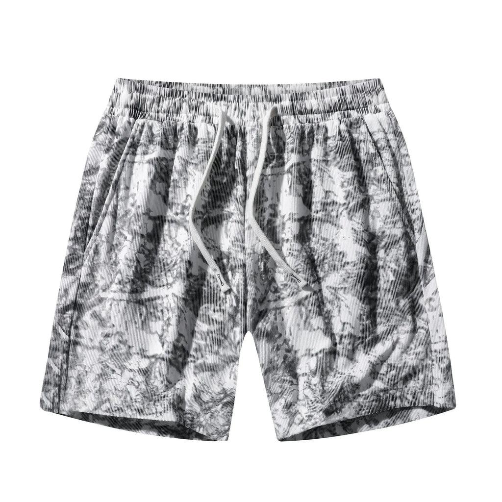 Men's straight-leg corduroy camouflage shorts in black, shown on a model.