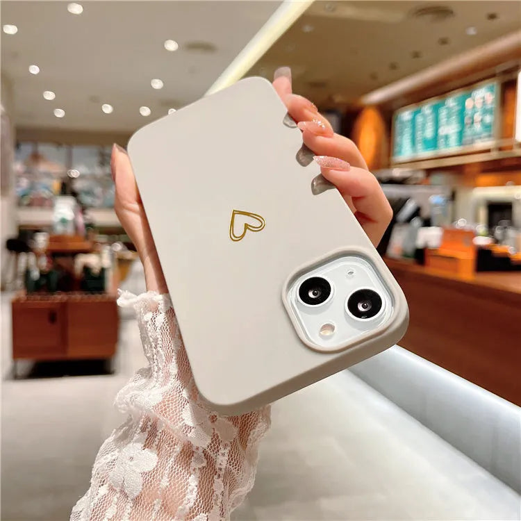 Brown silicone iPhone case with a hot-stamped love heart design on the back