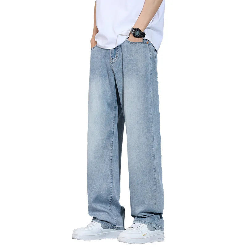Light blue ice silk straight-leg wide trousers laid flat, showing zip fly and relaxed leg cut.