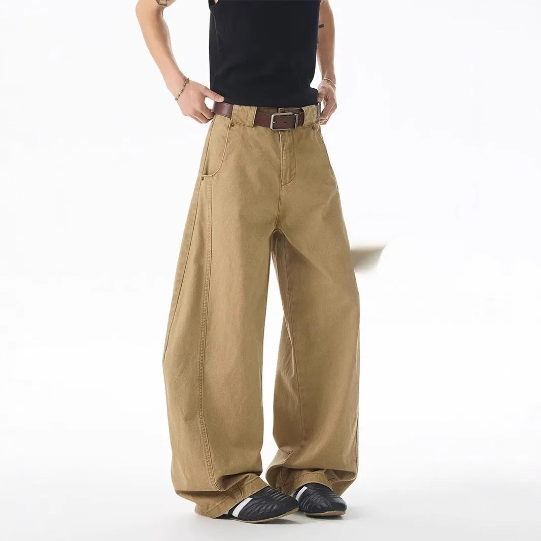Brown men's loose fit casual jeans with straight leg design and button flight opening