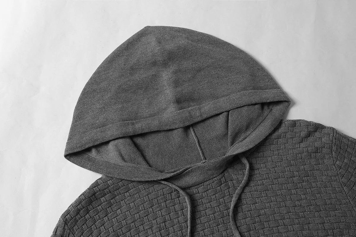 A men's hoodie sweater in a cotton-polyester blend, shown in one of nine available colours including black, navy, or grey.