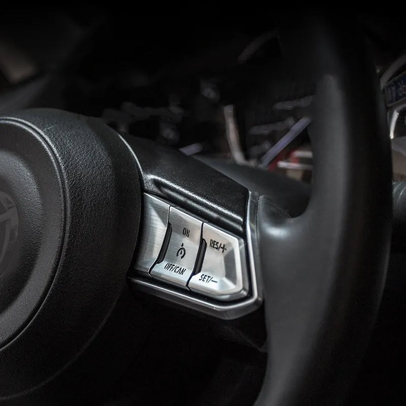 Atz aluminium alloy steering wheel decorative sticker set showing brushed red, silver, and blue hollow buttons