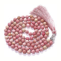 Long colourful agate and stone bead necklace with a geometric tassel, measuring 95-100cm