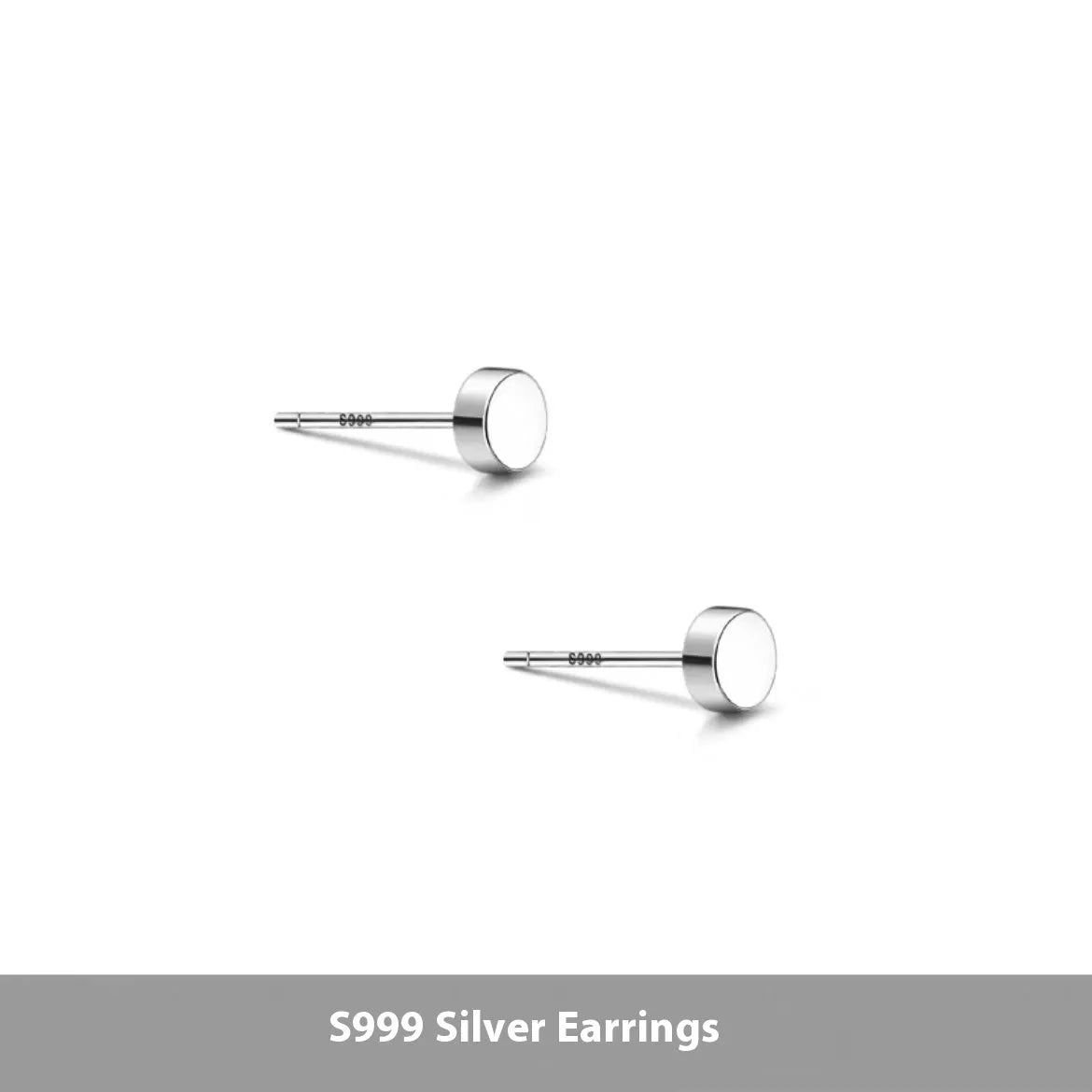 A pair of simple, round, flat-fronted S999 sterling silver ear bone studs on a plain background.