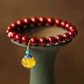Gold cinnabar wave bracelet with copper beads, national style design