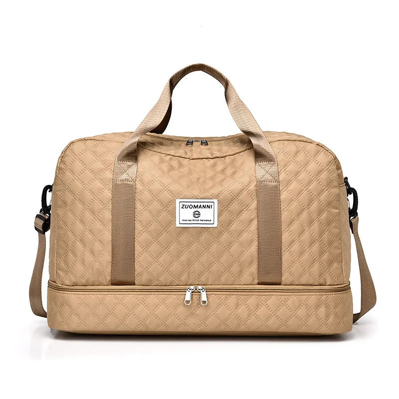 Large Oxford cloth travel bag with 36-55 litre capacity shown in haze blue colour