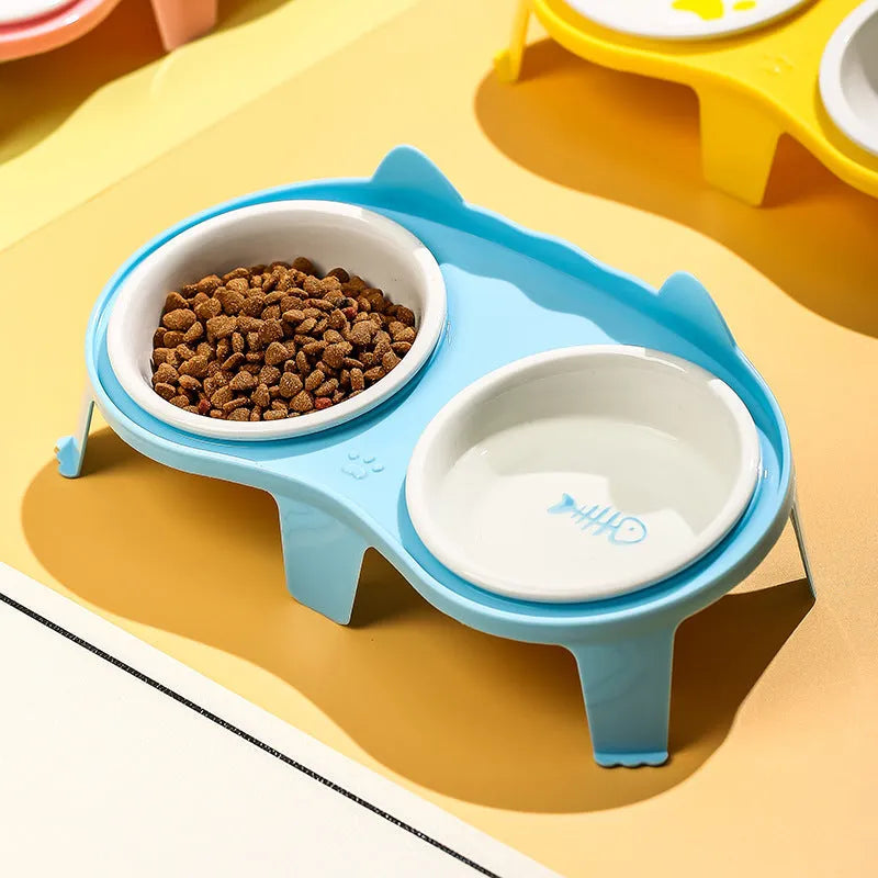 Ceramic cat food and water bowl set on elevated tilted ABS plastic stand in blue colour