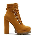 Women's suede ankle boots with thick high heels, round toe, and buckle details in army green