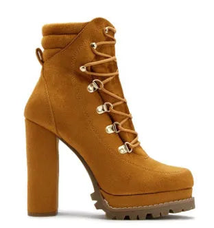 Women's suede ankle boots with thick high heels, round toe, and buckle details in army green