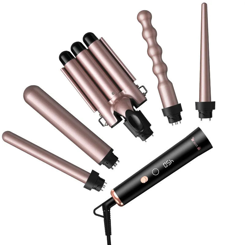 Rose gold hair curler with LCD display and multiple interchangeable tubes on a colour box, with protective gloves.