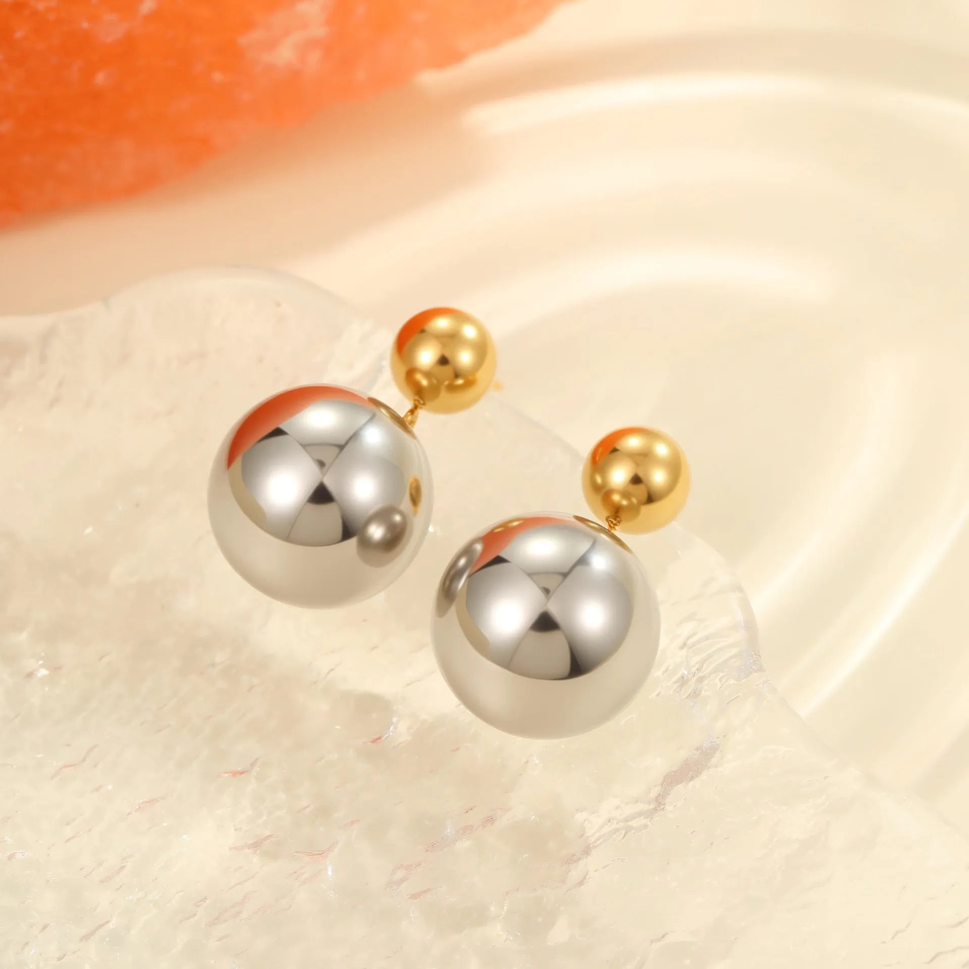 Stainless steel colour-block ear studs with round bead geometry and 18K gold electroplating