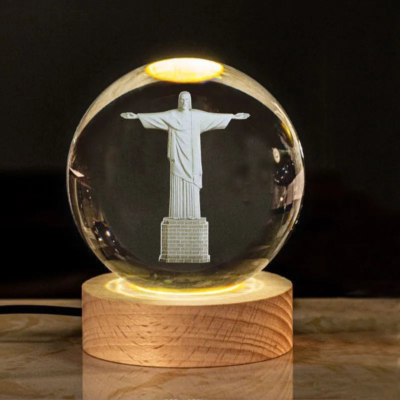 White crystal lamp with 6cm diameter orb on solid wood warm light base showing religious ornamentation