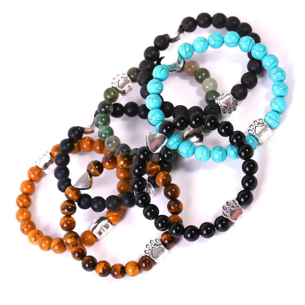 Tigereye Indian Agate stone beaded dog's paw bracelet on wrist, showing geometry shape and round beads.