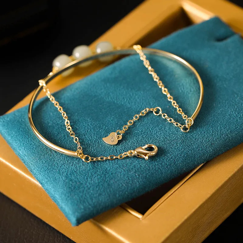 Women's Hetian jade lucky beads bracelet with gold inlay treatment in single, double, and three beads versions