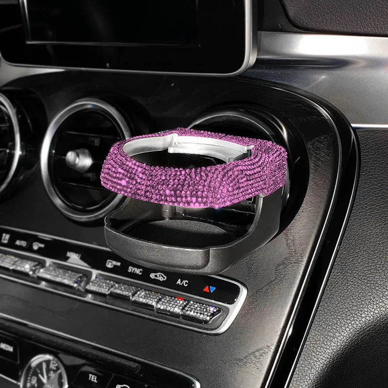 Rhinestone-decorated car cup holder bracket mounted on vehicle air vent in multiple colour options