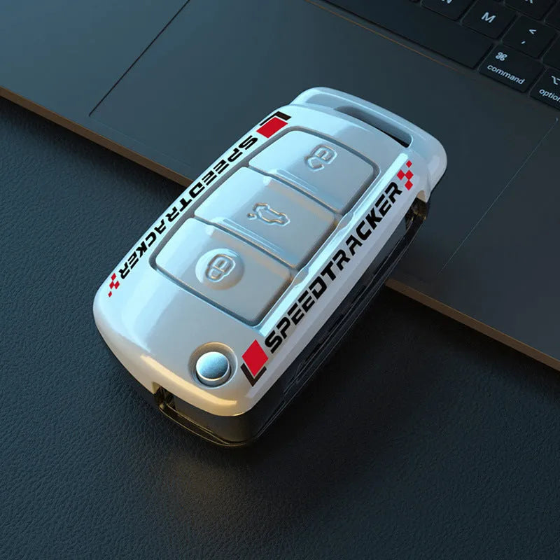 Carbon fibre style car key cover with mirrored finish in carbon pattern and white colour options