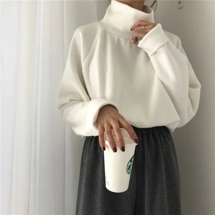 Women's half-high collar long sleeve top in solid colour with loose fit design