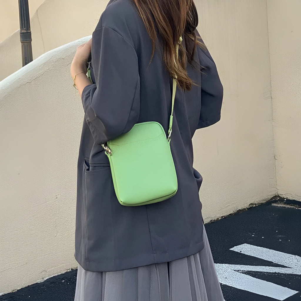 Solid colour women's crossbody phone bag in black, beige, khaki, or green.