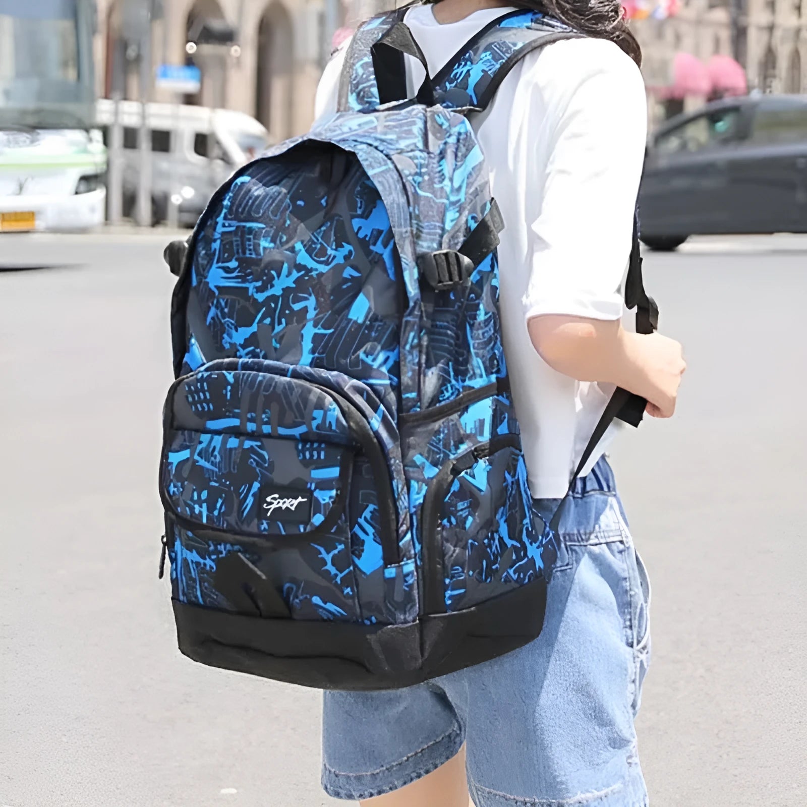Classic nylon backpack in blue and red colours with large capacity for travel and school use