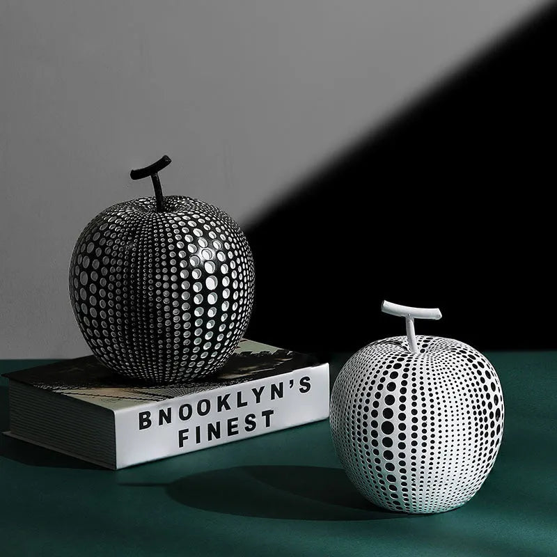 Resin decorative crafts set showing high black apple and low white pear sculptures