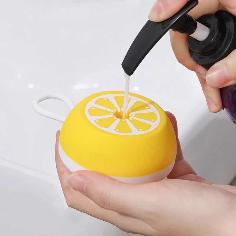 Pet grooming brush with 2-in-1 design showing massage head and comb teeth in soft silicone construction