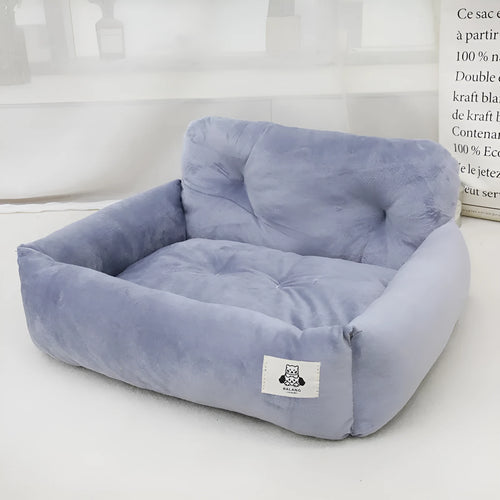 Car-mounted pet travel nest in stain-resistant cloth with grey or blue plaid options